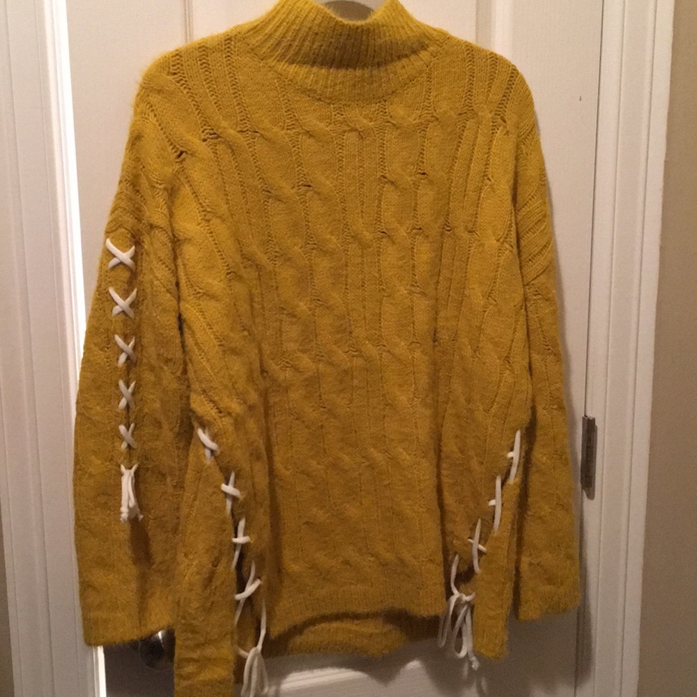 Super soft sweater with lacing on sides & sleeves